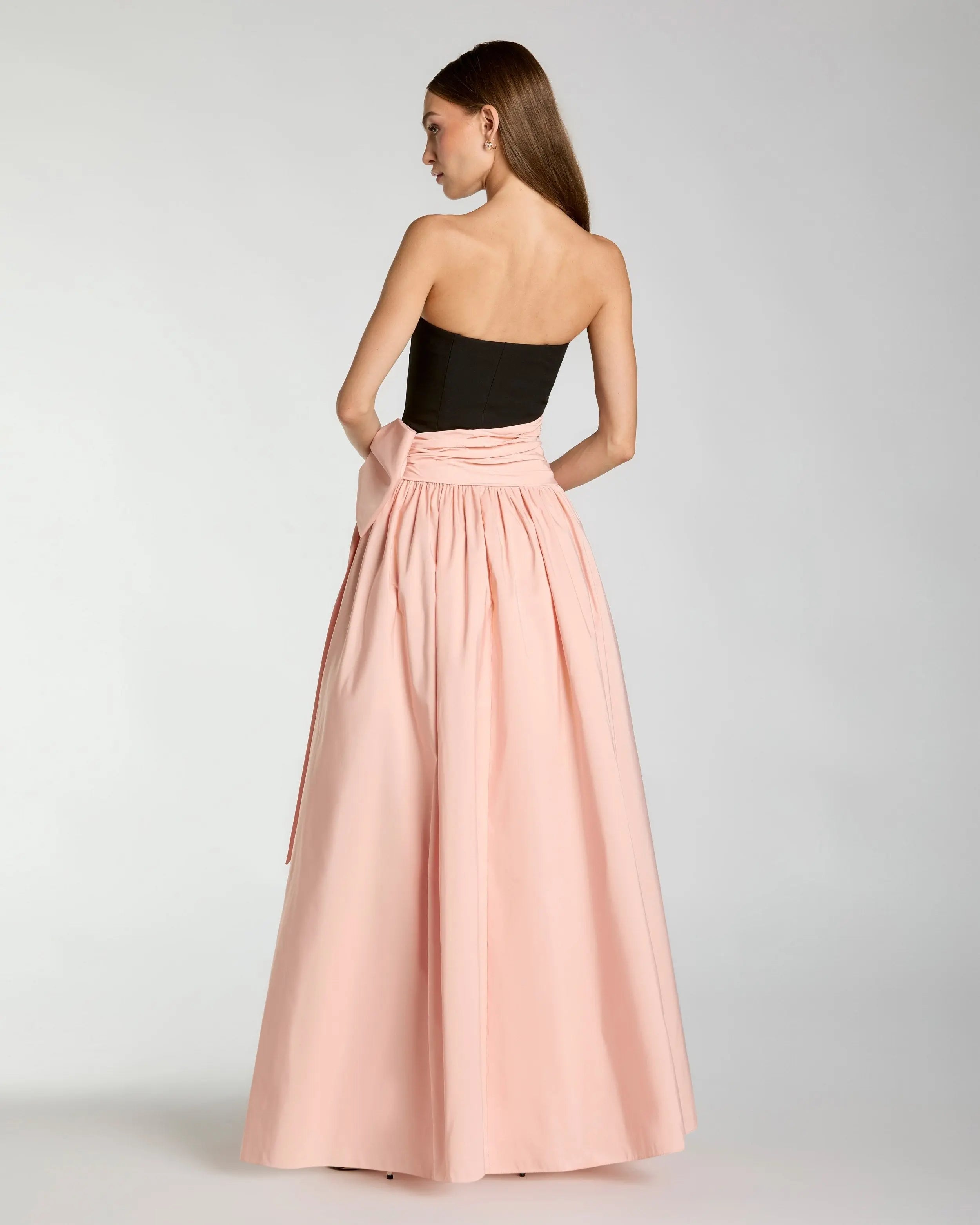 Black Pink Strapless Gown With Oversized Bow