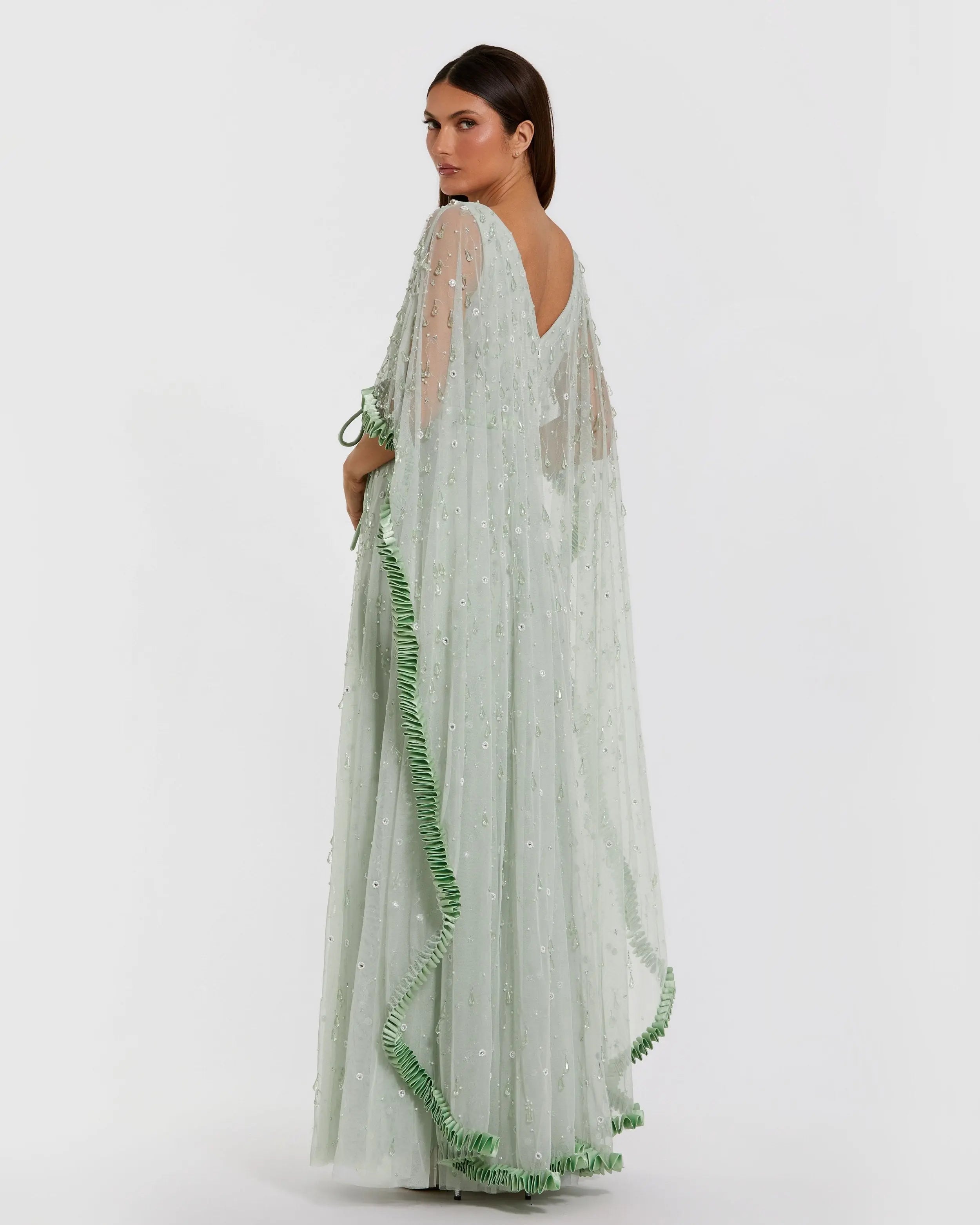 Green Beaded Cape Sleeve Gown With Ruffle Trim