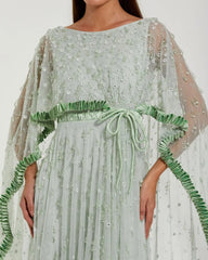 Green Beaded Cape Sleeve Gown With Ruffle Trim